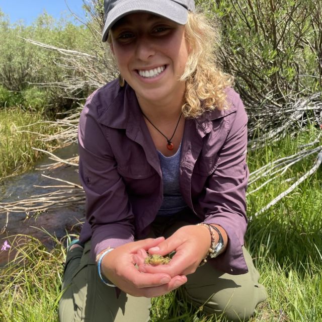 Janna holding a frog